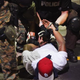 Police arrest a demonstrator protesting the killing of teenager Michael Brown on Aug. 19, 2014, in Ferguson, Mo.
Scott Olson/Getty Images